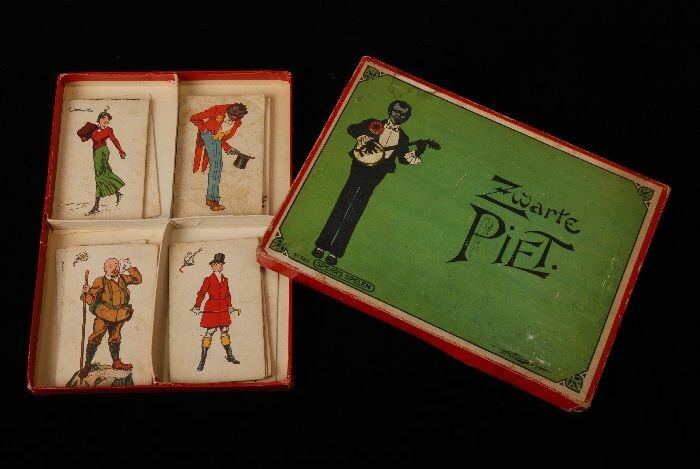 maak een foto Buiten vinger Collectiestuk: Kaartspel met opschrift "Zwarte Piet", in groen-rode doos  met deksel | Museum Rotterdam